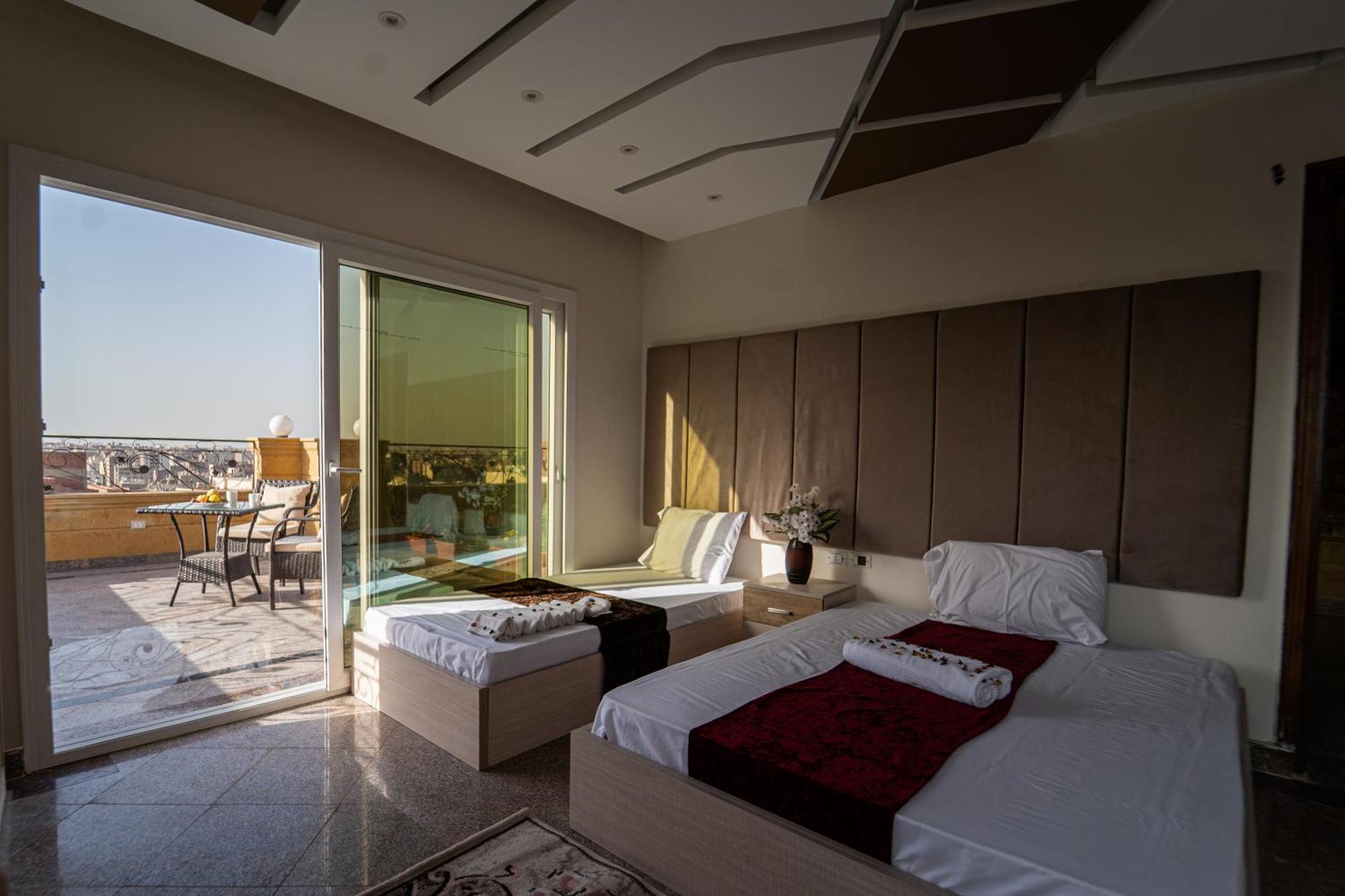 Gardenia Pyramids View Inn Nazlet el-Sîsi Exterior photo